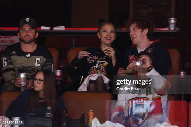 Ariana Grande and Ethan Slater look on prior to Game One of the 2024 Stanley Cup Final between the Florida Panthers and the Edmonton Oilers at...