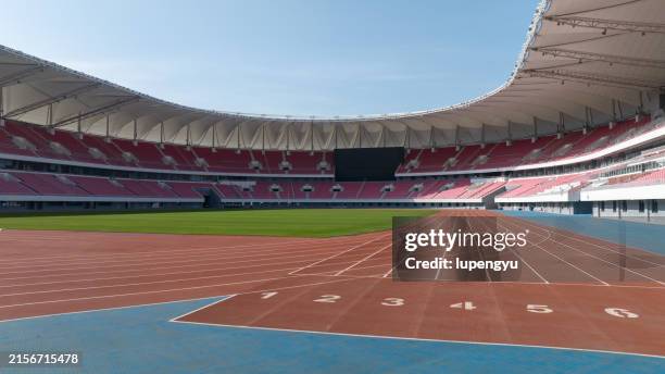 soccer field sports track - athletics stadium stock pictures, royalty-free photos & images