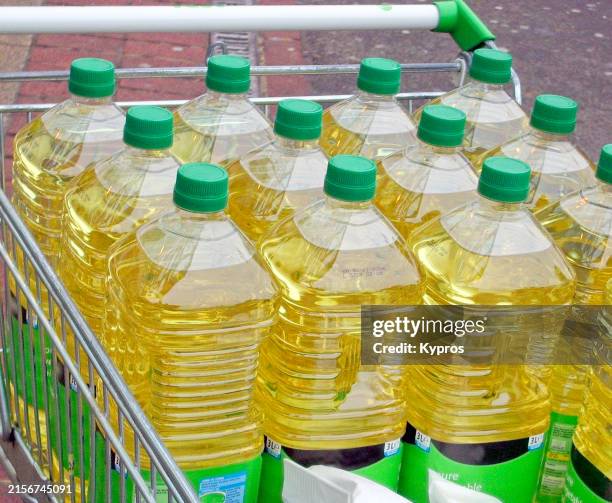 plastic bottles filled with cooking oil - cooking oil stock pictures, royalty-free photos & images
