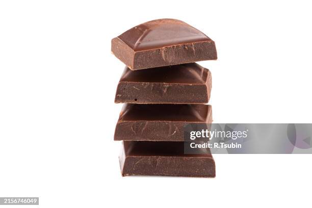 natural chocolate milk dark bar isolated on white - cioccolato al latte foto e immagini stock