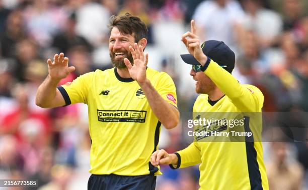 Michael Neser of Hampshire Hawks celebrates the wicket of Will Smeed of Somerset with team mate Liam Dawson during the T20 Vitality Blast match...
