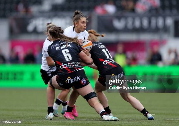 Holly Aitchison of Bristol Bears is tackled by Sophie de Goede and Paige Farries of Saracens during the Allianz Premiership Women's Rugby match...