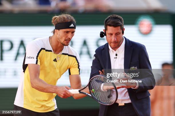 Alexander Zverev of Germany reacts to a line call with the umpire against Carlos Alcaraz of Spain during the Men's Singles Final match on Day 15 of...
