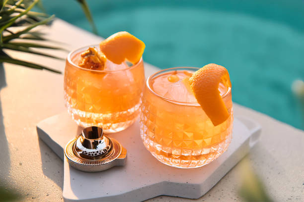 close-up of glasses with spritz - orange cocktail stock pictures, royalty-free photos & images