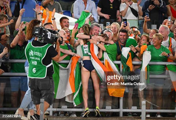 Gold medallist, Ciara Mageean of Team Ireland, celebrates with members of the crowd after winning in the Women's 1500m Final on day three of the 26th...
