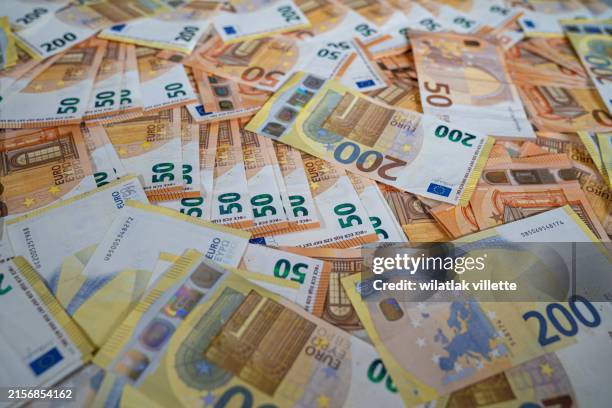 close-up of european union currency. - richesse photos et images de collection