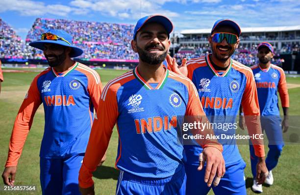 Virat Kohli and Axar Patel of India react after the ICC Men's T20 Cricket World Cup West Indies & USA 2024 match between India and Pakistan at Nassau...