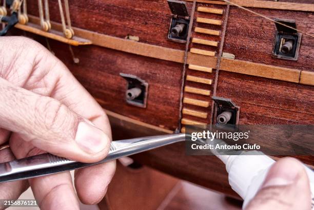 hobby of wooden model ship building. building a historic model ship: a spanish galleon - building a model ship fotografías e imágenes de stock