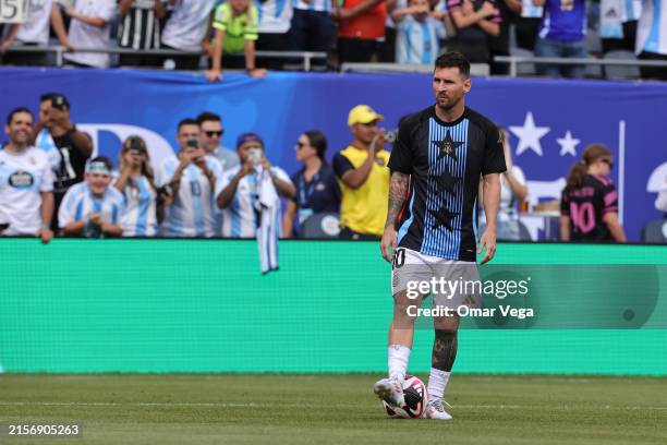 Lionel Messi of Argentina warms up before the International Friendly match between Argentina and Ecuador at Soldier Field on June 9, 2024 in Chicago,...