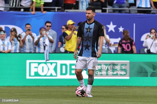 Lionel Messi of Argentina warms up before the International Friendly match between Argentina and Ecuador at Soldier Field on June 9, 2024 in Chicago,...