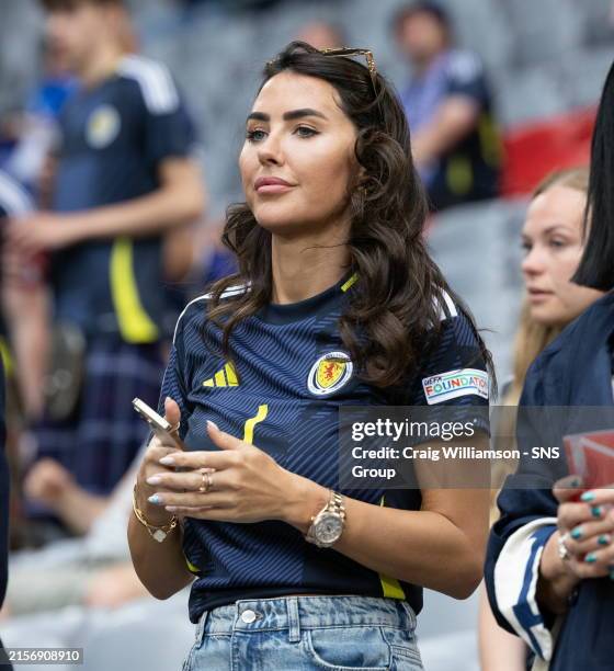 Jade Kelly Mills , the girlfriend of goalkeeper Angus Gunn during a 2024 UEFA European Football Championship Group A match between Germany and...