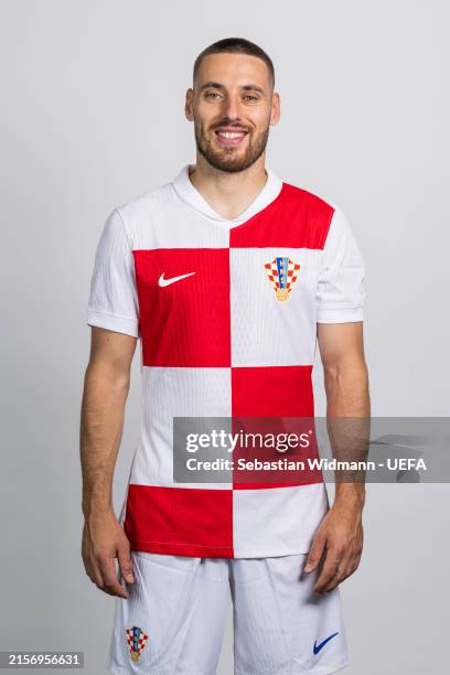 Nikola Vlasic of Croatia poses for a portrait during the Croatia Portrait session ahead of the UEFA EURO 2024 Germany on June 10, 2024 in Neuruppin,...
