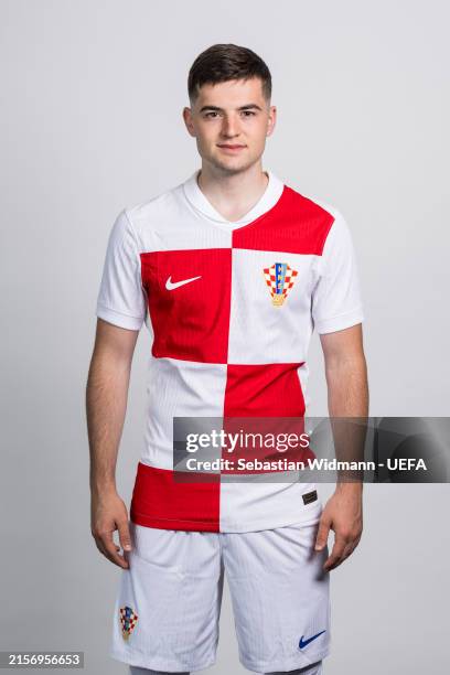 Martin Baturina of Croatia poses for a portrait during the Croatia Portrait session ahead of the UEFA EURO 2024 Germany on June 10, 2024 in...