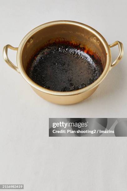 object, pot, burnt thing - kitchen utensil stock pictures, royalty-free photos & images