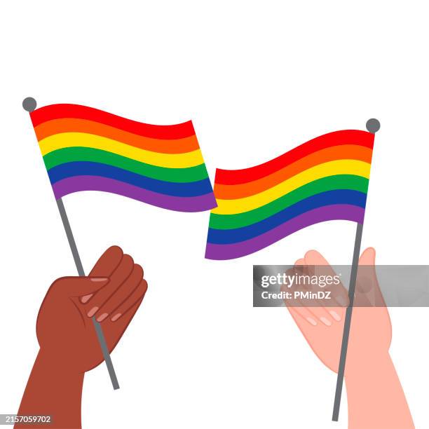 pride month illustrations,hand holding flag - rockefeller center flags stock illustrations