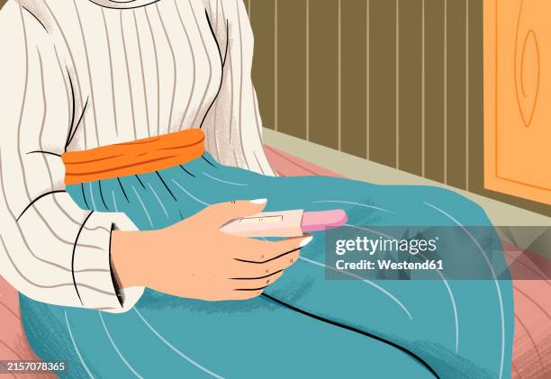 unrecognizable person holding negative pregnancy test in hand - testing kit stock illustrations