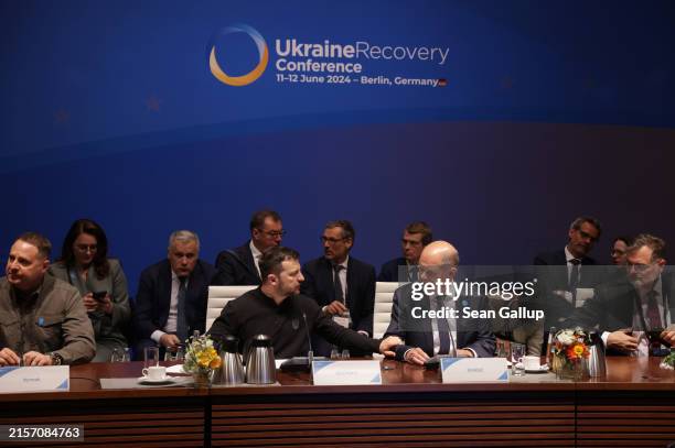 German Chancellor Olaf Scholz and Ukrainian President Volodymyr Zelensky attend the high-level segment at the 2024 Ukraine Recovery Conference on...
