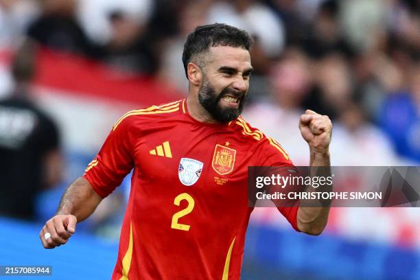 Spain's defender Dani Carvajal celebrates after scoring his team's third goal during the UEFA Euro 2024 Group B football match between Spain and...