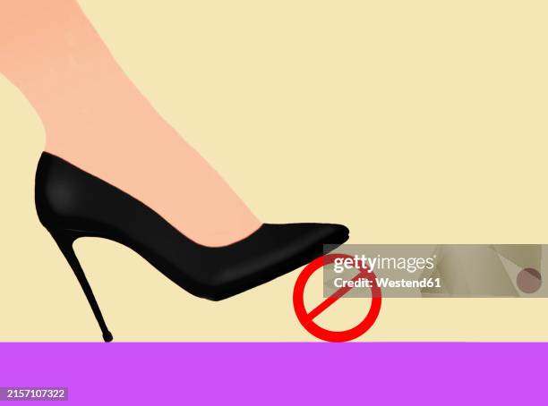 women foot wearing high heel and stepping on forbidden sign - purple shoes heels stock illustrations