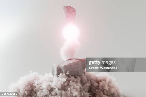 3d render of rocks and bright sphere over clouds - pile of rocks white background stock illustrations
