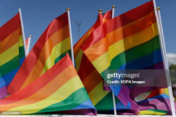 Rainbow flags are displayed for sale before the start of the Equality Parade. Thousands of people participated in the Equality Parade in the center...