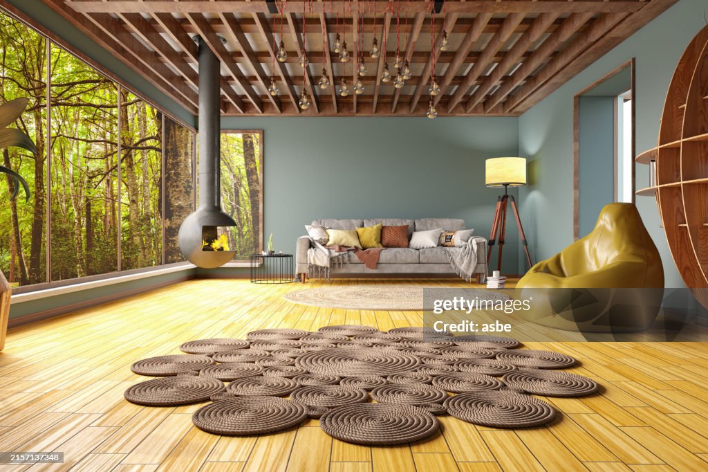 森の景色を望む居心地の良いリビングルーム