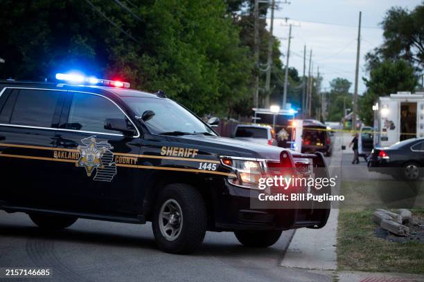 Police investigate the scene of a shooting at the Brooklands Plaza Splash Pad on June 15, 2024 in Rochester Hills, Michigan. A gunman reportedly...
