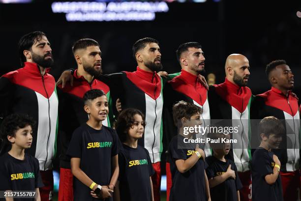 Palestinian players look on as the national anthem is played during the Second Round FIFA World Cup 2026 Qualifier match between Australia Socceroos...