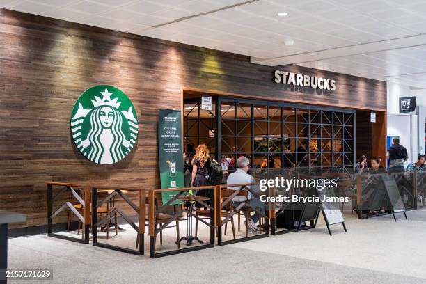 starbucks at bush intercontinental - starbucks stock pictures, royalty-free photos & images