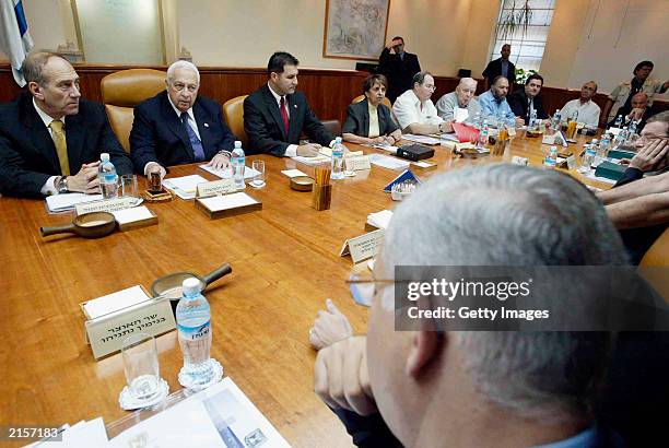 Israeli Prime Minister Ariel Sharon attends his weekly cabinet meeting on July 13, 2003 in Jerusalem, Israel. Sharon will be travelling to England...