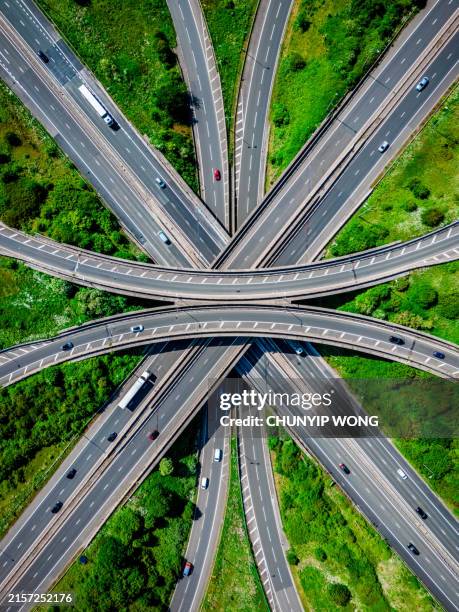 aerial shot of almondsbury roundabout at junction 16, m5 and m4 motorway near bristol, uk - väg bildbanksfoton och bilder