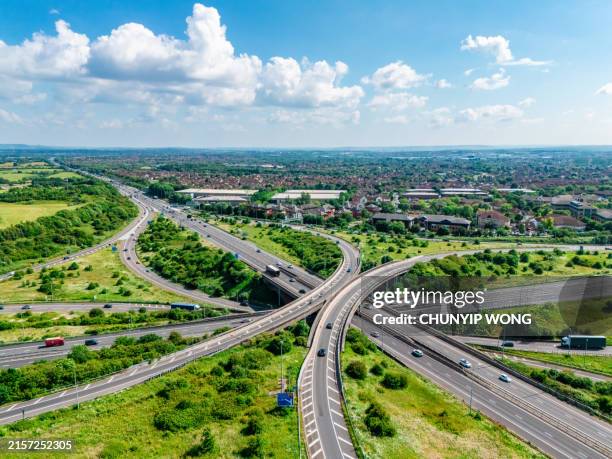 aerial shot of almondsbury roundabout at junction 16, m5 and m4 motorway near bristol, uk - m5 motorway stock pictures, royalty-free photos & images
