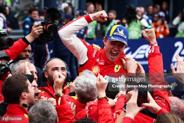 Race winner Nicklas Nielsen of Denmark and Ferrari AF Corse, celebrates in parc ferme at the Le Mans 24 Hour Race at the Circuit de la Sarthe on June...