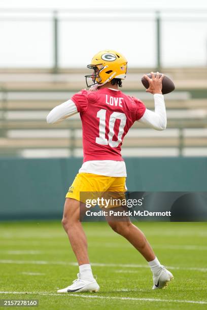 Jordan Love of the Green Bay Packers participates in drills during the Green Bay Packers Minicamp at Ray Nitschke Field on June 11, 2024 in Green...