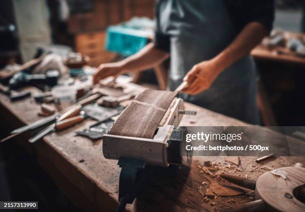 woman working in the workshop - carpenter machinery wood workshop stock pictures, royalty-free photos & images