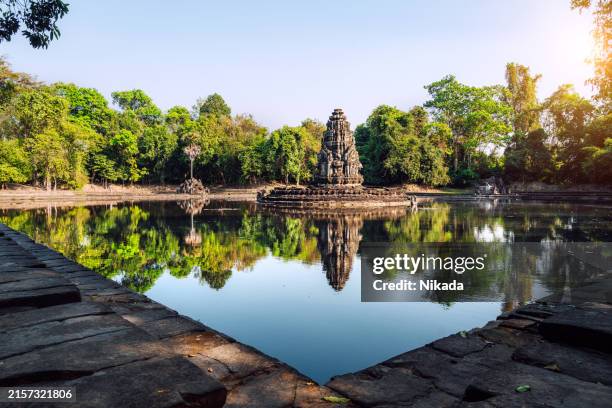 serene temple reflection in angkor wat area, cambodia - kambodjansk kultur bildbanksfoton och bilder