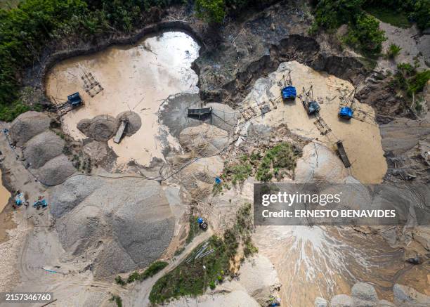 Aerial picture of dredges at an illegal gold mining area in the Madre de Dios department, in Peru's southeastern Amazon region, on May 31, 2024....