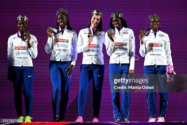 Gold medallists, Dina Asher-Smith, Desiree Henry, Amy Hunt, Daryll Neita and Asha Philip of Team Great Britain pose for a photo during the medal...