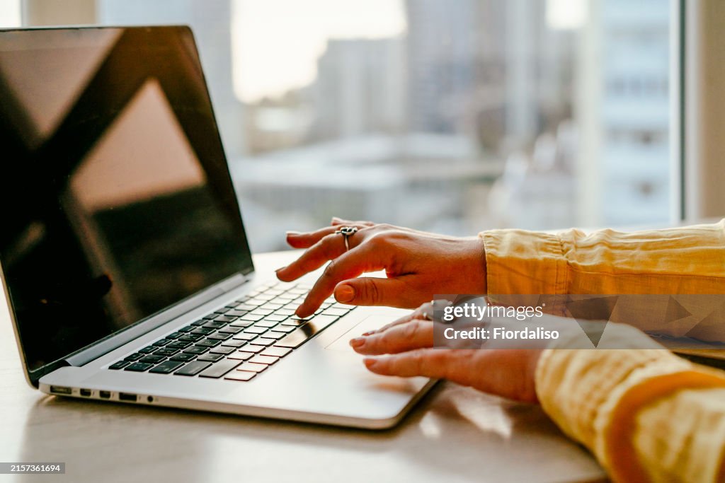 Portrait of a woman typing