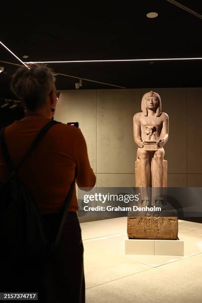Visitors view the Melbourne Winter Masterpieces exhibition "Pharoah" at NGV International on June 13, 2024 in Melbourne, Australia.