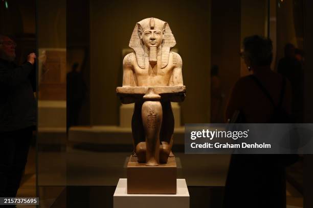 Visitors view the Melbourne Winter Masterpieces exhibition "Pharoah" at NGV International on June 13, 2024 in Melbourne, Australia.
