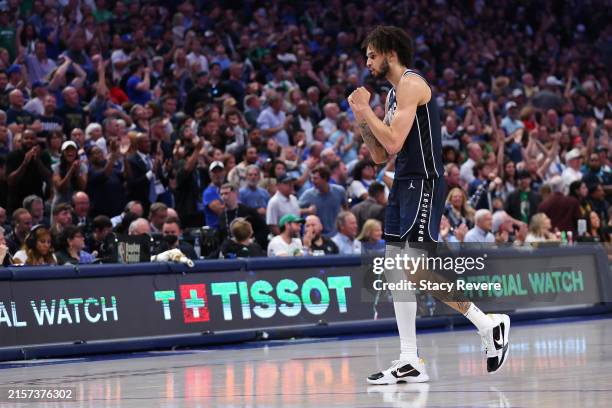 Dereck Lively II of the Dallas Mavericks celebrates after making a shot in the fourth quarter against the Boston Celtics in Game Three of the 2024...