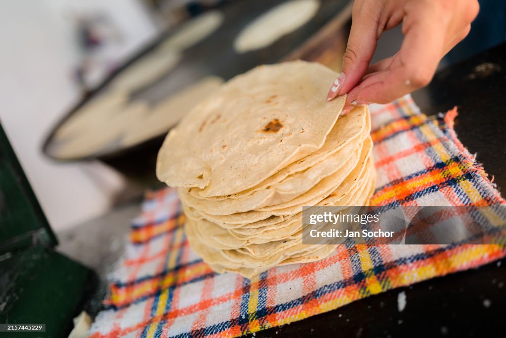 Making Tortillas At A Traditional Mexican Tortilleria