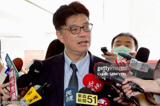 Taiwan's Minister of Mainland Affairs Council Chiu Chiu-Cheng, from the ruling Democratic Progressive Party , speaks during his arrival at the...