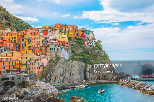 colorful cliffside houses in manarola, cinque terre, italy - portofino stock pictures, royalty-free photos & images
