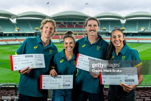 Australian Beach Volleyballers Zachery Schubert , Mariafe Artacho Del Solar , Thomas Hodges and Taliqua Clancy with their tickets to Paris during the...