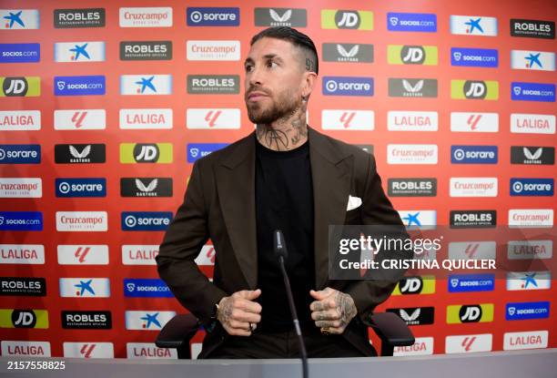 Sevilla FC's Spanish defender Sergio Ramos arrives at a press conference upon his annoucement that he quits his hometown club Sevilla FC, at the...