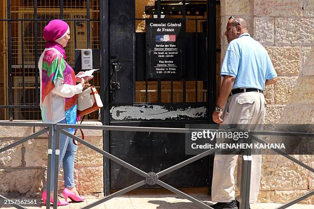 People outside the French consulate in Jerusalem on June 18, 2024. Jerusalem's deputy mayor, an ultranationalist Israeli politician, has asked for...