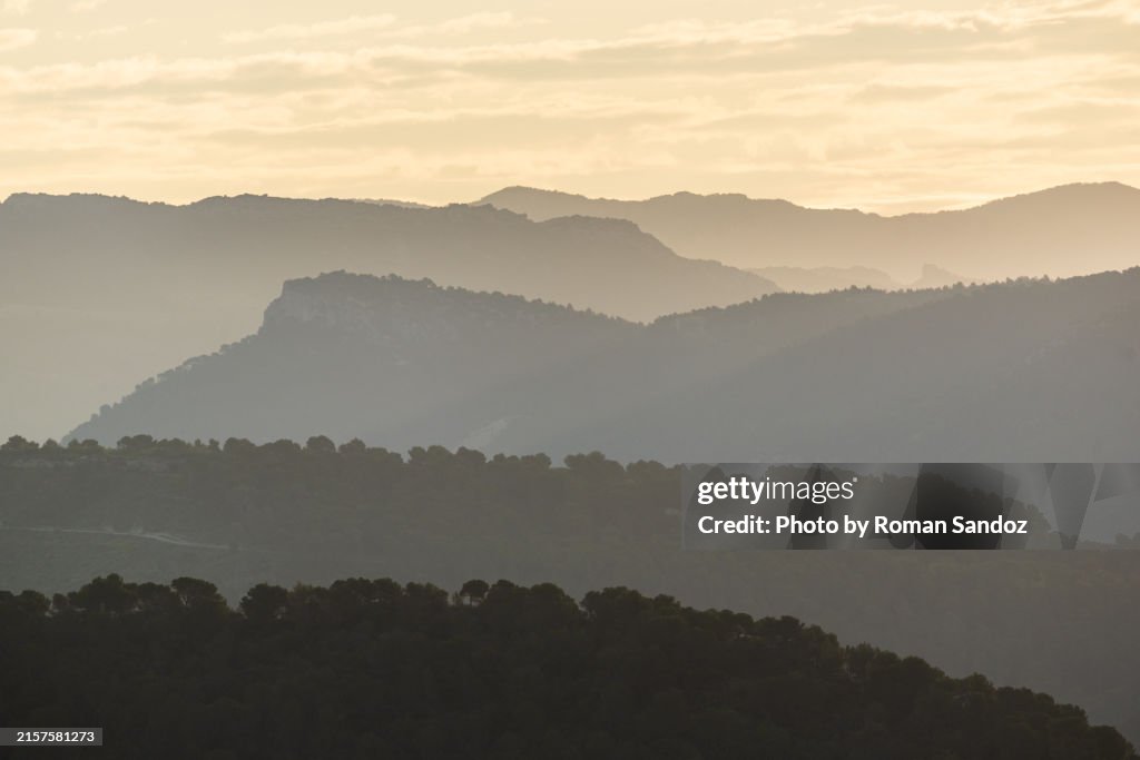 Different Ridges Sunrise Behind Different Layers Of Ridges High-Res Stock Photo - Getty ...