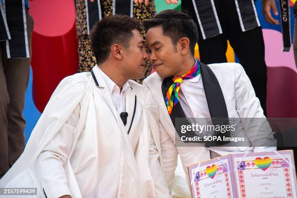 Couple poses for a photo during the celebration event at the Government house. Thailand has become the first country in Southeast Asia to approve...